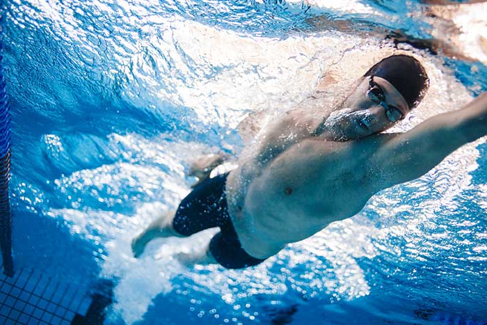 athlete swimming laps