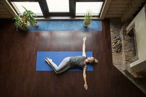 woman performing yoga twist