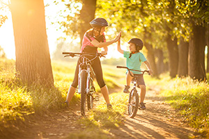 mother and son biking