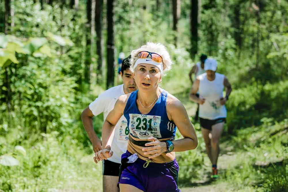 mature woman trail running