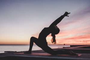 Woman doing yoga outside