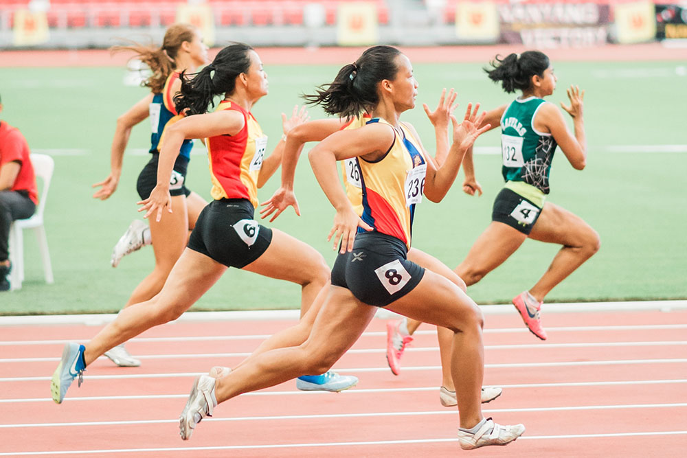 Group of women sprinting