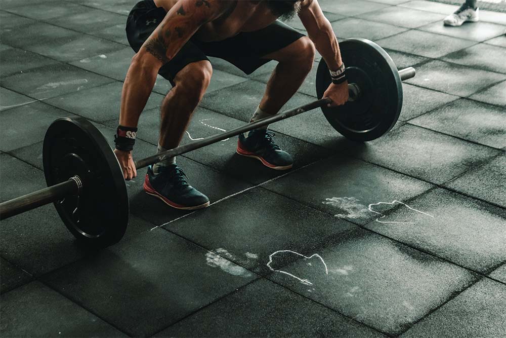 Athlete lifting barbell