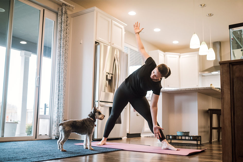 Woman exercising with her dog